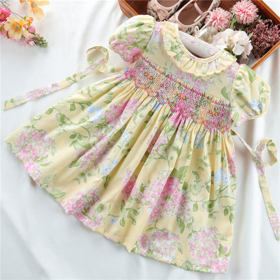 girls yellow floral smocked dress