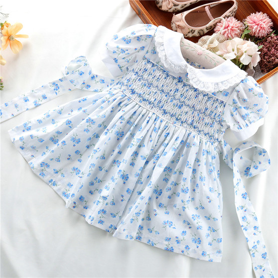 Baby girls blue smocked dress