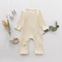 baby girls cream ribbed romper