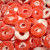 Red and white Strawberry flavoured rings dusted in sugar - Gluten free