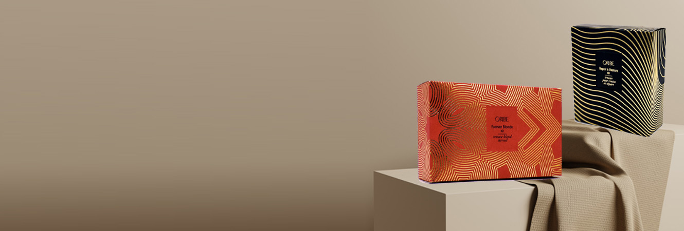 Luxury custom packaging highlighting premium materials and specialty finishes by Oliver.