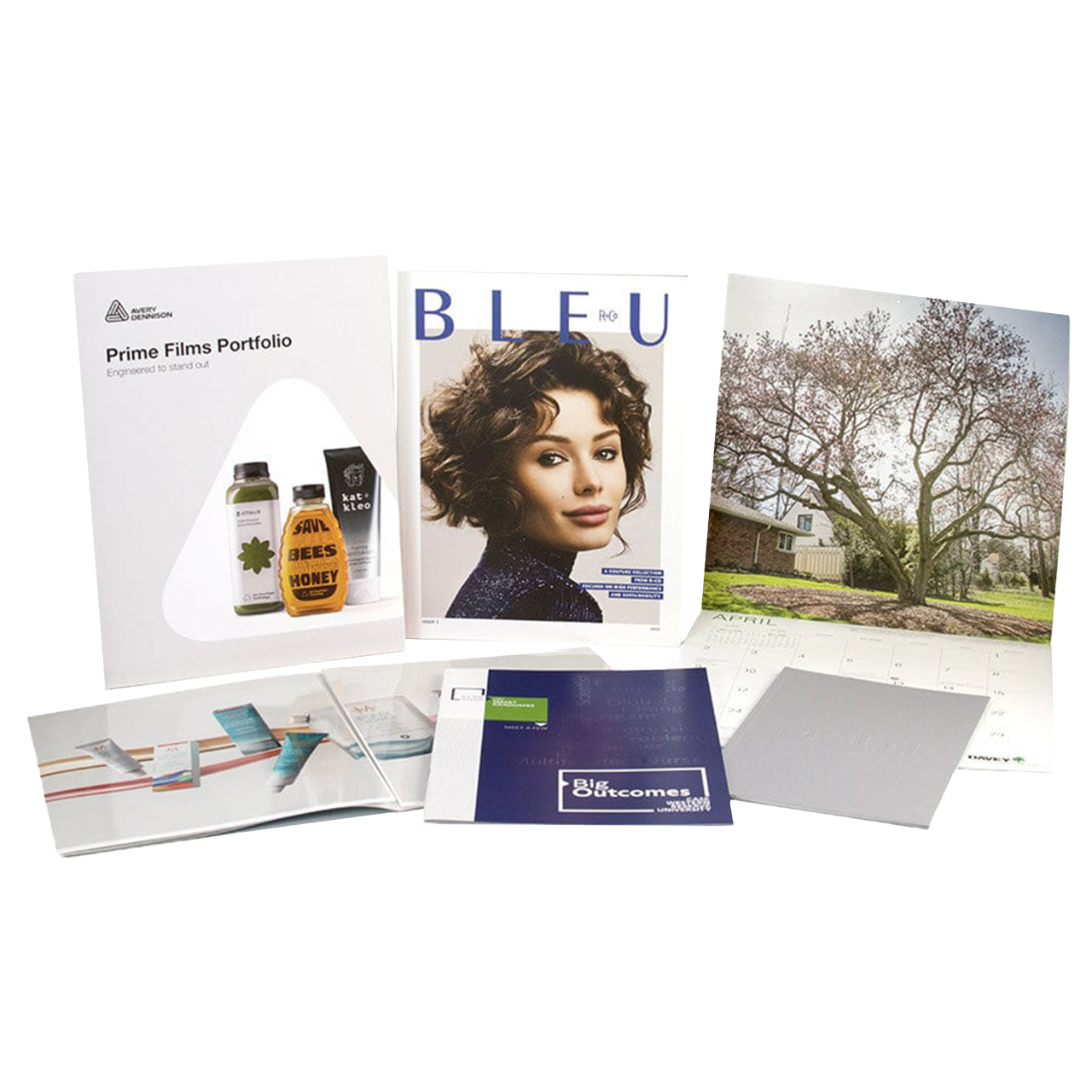 Branded marketing kit with sample booklets, calendars, and printed collateral