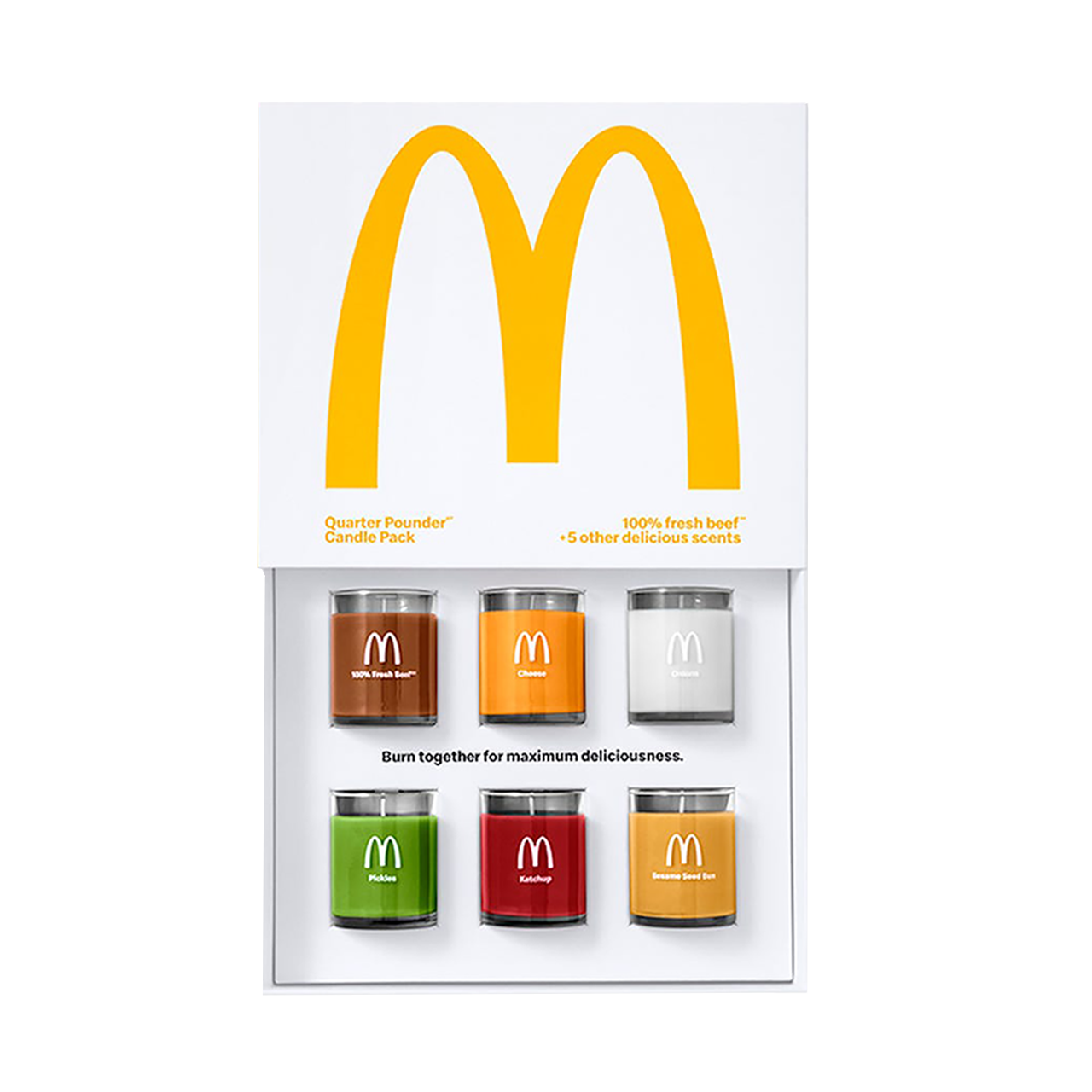 Rigid box featuring six candles with custom-fit inserts and a lift-top lid design