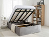 Inside view of Silver Velvet Storage Bed showing extra-deep gas-lift ottoman storage and reinforced steel frame