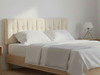 Elevate your sleep sanctuary with the Lottie Bed Headboard. Available in all UK sizes, it combines style and comfort for a stunning bedroom centrepiece.