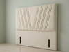 ​A chic headboard featuring cream-colored velvet fabric with vertical panel channeling, adding an elegant and clean-lined look to any bed.