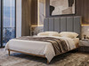 Cassia Wall Mount Headboard Panel with vertical fluted design, upholstered in luxurious fabric, adds elegance to any bedroom.