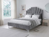 Evren Upholstered Bed Frame in smooth grey velvet fabric, featuring an Art Deco-infused stepped-up headboard with distinct accent lines and a low footboard