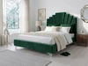 Evren Upholstered Bed Frame fully upholstered in rich green velvet fabric, featuring the signature Art Deco accent lines and modern wooden feet