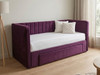 This image features a handcrafted Basil Day Bed upholstered in smooth amethyst velvet, showcasing a luxury sofa-style backrest with vertical fluted details and plain padded arms.