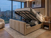 Beige velvet Lisbet Ottoman Storage Bed Frame, lifted open to display the heavy-duty under-bed storage capacity