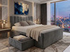 Gracia upholstered fabric bed frame in grey featuring a tall fluted headboard and integrated jumbo storage drawer
