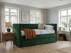 Noa Upholstered Daybed in green velvet, featuring an elegant fluted backrest and plain padded arms