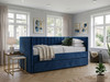 Noa Upholstered Daybed in blue velvet, featuring an elegant fluted backrest and plain padded arms