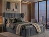 Modern grey velvet winged ottoman bed with high headboard and matching fluted footboard available in single, double, and king sizes.