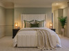 Front view of the Carla Wingback Ottoman bed in Ivory Cream, featuring deep fluted vertical channels on the headboard.