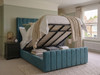 Carla Wingback Ottoman bed in Teal Atlanta fabric, shown with the mattress lifted to reveal the spacious under-bed storage area.