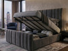 Grey velvet Selva Ottoman Storage Bed Frame lifted open, revealing a high-capacity storage area with a dust-free solid wooden base and a smooth gas-lift mechanism.