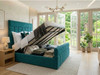 Maricela ottoman storage bed in teal bouclé, lifted open on gas-lift struts to show the large storage space, with a vertical channelled headboard and footboard