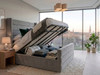 Grey velvet Desiree ottoman bed open on gas-lift struts showing the solid storage base