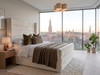 Desiree wingback ottoman bed in cream velvet with square-shouldered wings and channelled 52cm footboard