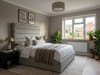 Grey linen Melisa ottoman bed with the gas-lift base raised, showing the large storage space beneath the mattress.
