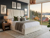 Asta Ottoman storage bed frame upholstered in luxurious cream velvet, showcasing a contemporary silhouette and a tall, vertically channeled headboard