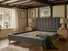 Zofia upholstered bed frame in charcoal linen fabric, shown without a mattress to display the heavy-duty solid wooden slats and robust centre support bar