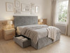 Modern bedroom featuring the Zanna upholstered bed frame in plush grey velvet, showing the large side storage drawer pulled out.