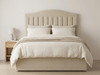 Sissel floor standing headboard in cream linen fabric with matching divan bed