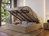 Nora ottoman bed base in beige velvet fabric with the gas-lift lid open, showing the deep storage area with huge capacity for bedding and blankets