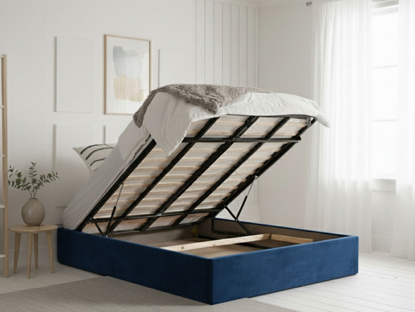 Austin Blue Ottoman Bed Base with gas-lift storage open, showing the heavy-duty steel frame and solid base boards.