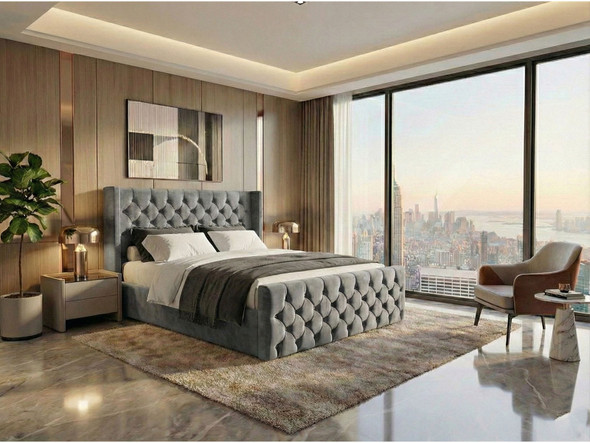 Full view of the upholstered Reina Ottoman Storage Bed Frame in plush grey velvet fabric with diamond tufted headboard details