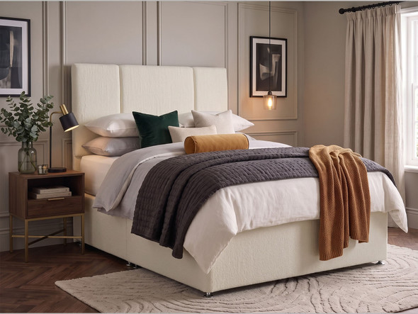 Arlo triptych headboard in Ivory Atlanta fabric shown with a matching divan bed set