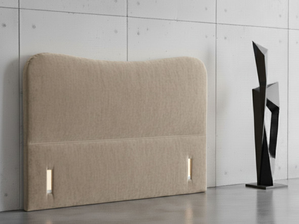 Elevate your sleep experience with the Ariyah Floor Standing Headboard. Handcrafted in the UK, it offers style, stability, and a range of luxurious fabrics.