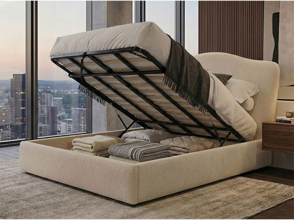 Francisca ottoman storage bed in cream velvet fabric, shown with the slatted base and mattress lifted in the open position to reveal the spacious under-bed storage compartment containing a black bag and boxes.