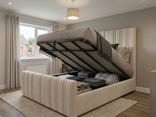 Pale cream smooth velvet ottoman storage bed frame with the mattress lifted to reveal the internal storage base.