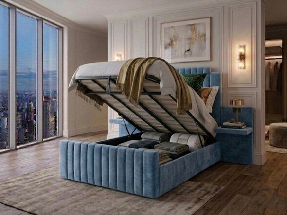 Sky blue velvet Evelia Ottoman Storage Bed Frame shown with the gas-lift mechanism elevated, revealing a spacious, heavy-duty hidden storage compartment
