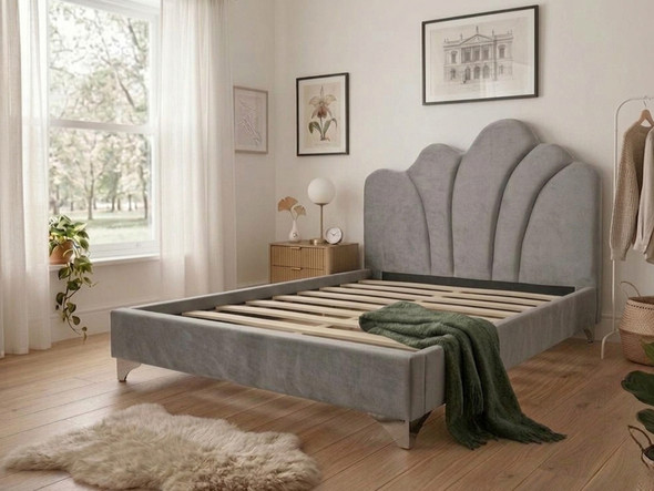 Inside view of the grey velvet upholstered bed frame base, displaying the heavy-duty construction with solid wooden slats and a sturdy centre support bar for maximum mattress stability.