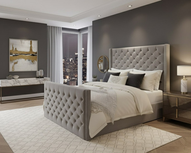 Experience elegance with the Julian Ottoman Storage Bed, designed with an extra high headboard and deep buttoned details, combining style and practical storage solutions.