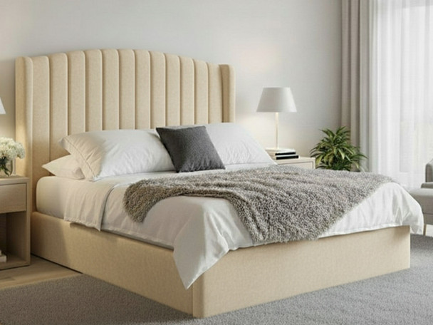 Discover the elegance of the Lorelei Ottoman Storage Bed, featuring a curved wing headboard with fluted accents and a low footboard for a stylish bedroom upgrade.