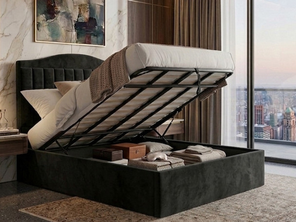 Rosalina Ottoman storage bed frame in black velvet, with the mattress base raised to display the hidden storage capacity