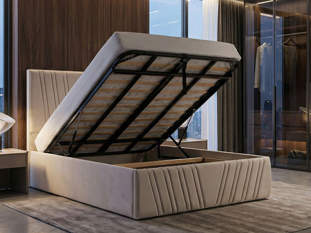 Juana ottoman bed in cream velvet with gas lift raised showing deep storage space and solid base