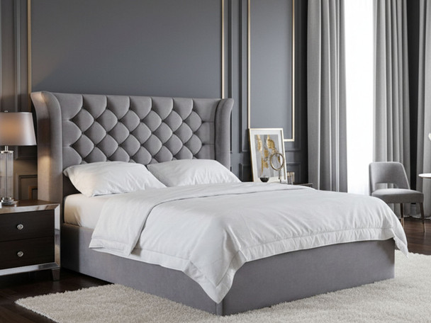 Discover the Sienna Ottoman Storage Bed Frame, featuring stylish curved wings, a deep buttoned headboard, and a low footboard for a chic bedroom upgrade.