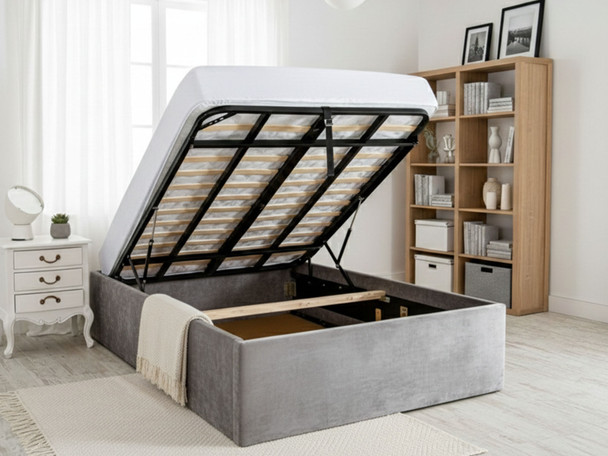 Inside view of Silver Velvet Storage Bed showing extra-deep gas-lift ottoman storage and reinforced steel frame