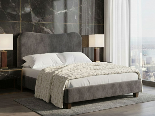 Discover the Bonnie Upholstered Bed Frame, featuring an elegantly curved headboard that adds a touch of sophistication to your bedroom decor.