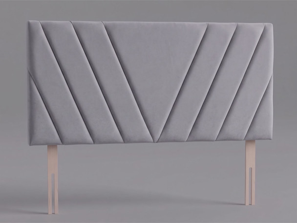Valencia bed headboard in Armour velvet fabric with a V-shaped chevron of diagonal padded channels and wooden fixing struts