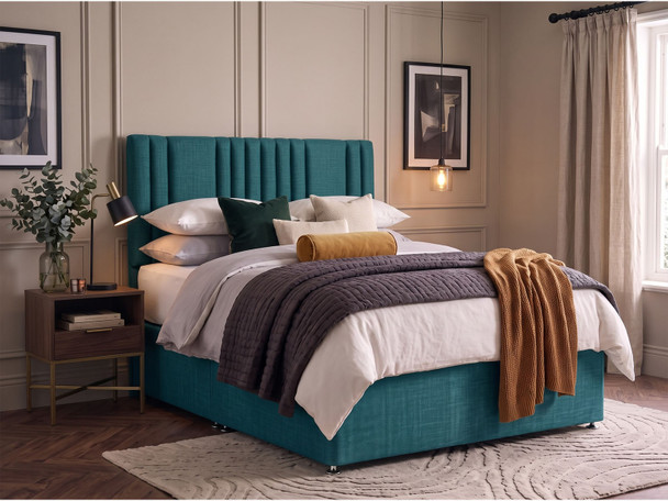 Lennox fluted headboard in Teal Atlanta fabric shown with a matching divan bed set