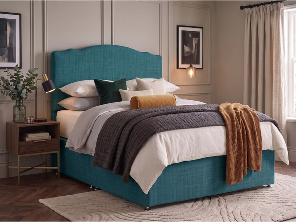 Ashbury crown top headboard in Teal Atlanta fabric shown with a matching divan bed set