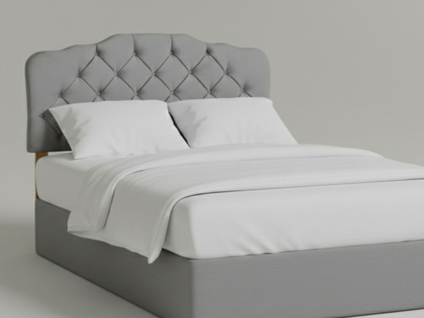 Transform your sleeping space with the Zoe Bed Headboard. Its elegant tufted design and cozy padding make it a stylish centerpiece for any bedroom decor.